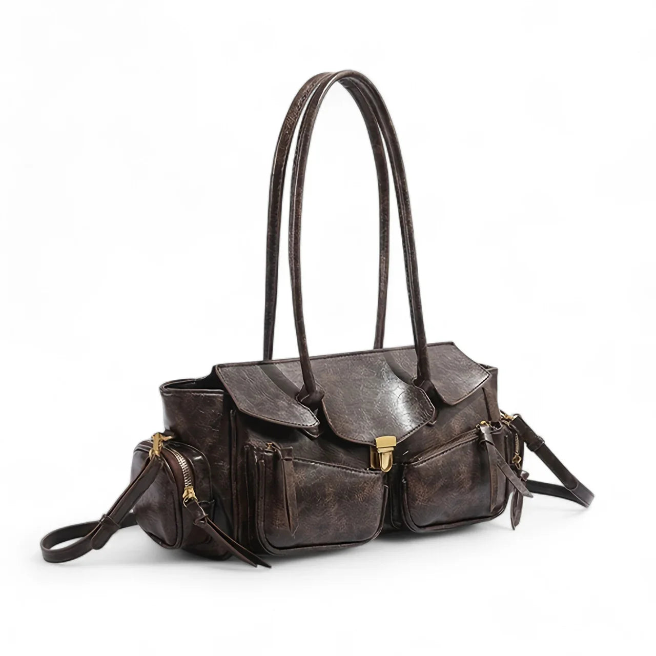 Sac à main Jila en cuir, spacieux et structuré, idéal pour transporter téléphone, portefeuille et accessoires avec style et praticité.