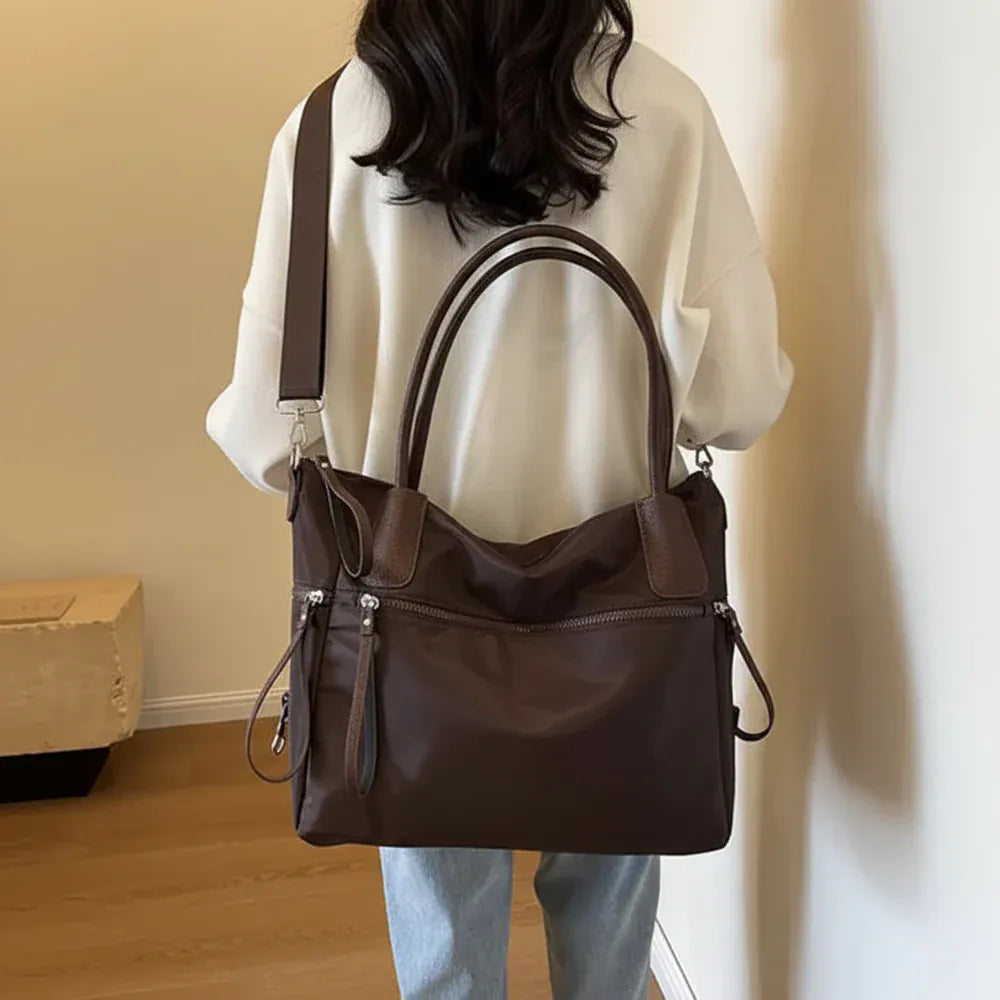 Naya - Sac Bandoulière Grande Capacité marron foncé Femme pour Ordinateur 15 Pouces, Cahiers, Documents A4 et Essentiels