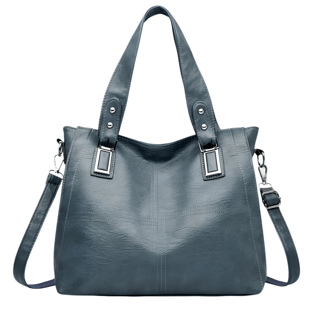 ROSALINE – Sac à main de cours à bandoulière en cuir vegan bleu, chic et pratique pour femme.