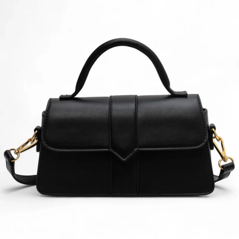 Sac à main VALENTINA petit format en cuir lisse vegan noir, design raffiné et sobre, parfait pour transporter vos essentiels avec style