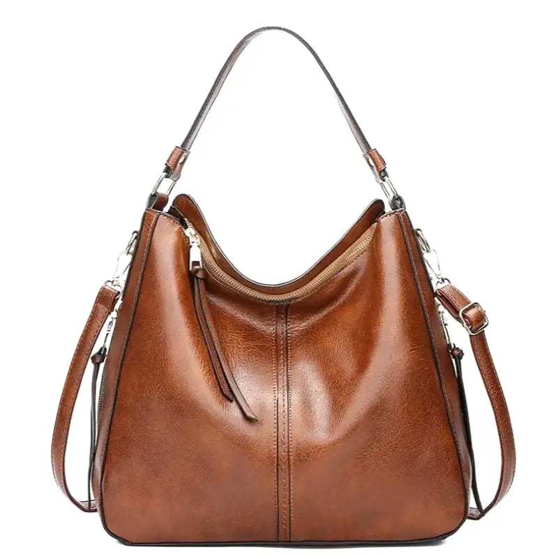 Sac à main AURA en cuir synthétique, large et spacieux, avec bandoulière réglable, alliant élégance et praticité pour femmes modernes