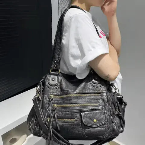 MELANIA - Sac à Main en Cuir Vintage à Poches Zipées noir Femme pour Ordinateur, Cahiers et Documents A4, porté épaule