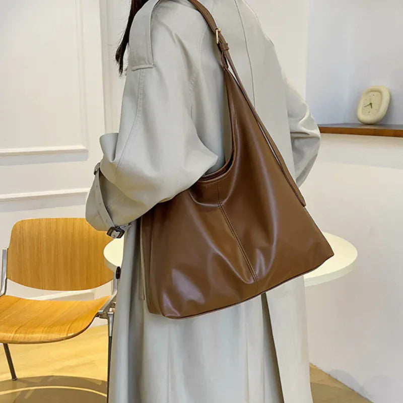 RAKEL - Sac Hobo en Cuir Femme Marron Souple et Grande Capacité pour Ordinateur, Cahiers et Essentiels, porté épaule