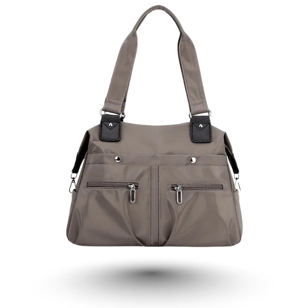 ROMY – Sac multi-poches gris, tendance et fonctionnel, parfait pour étudiantes et professionnelles.