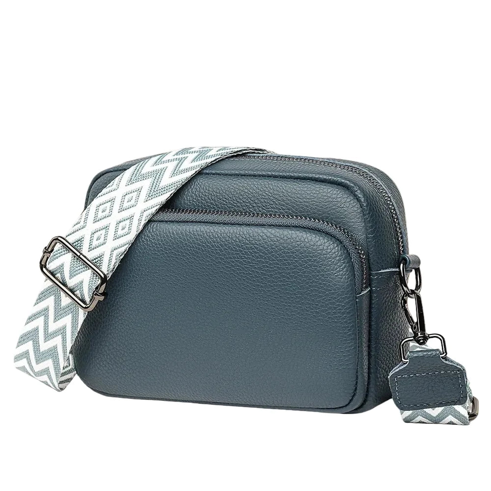 Sidra - Petit Sac Bandoulière Large Femme, sac femme compact en cuir vegan avec large sangle réglable au motif géométrique, couleur bleu